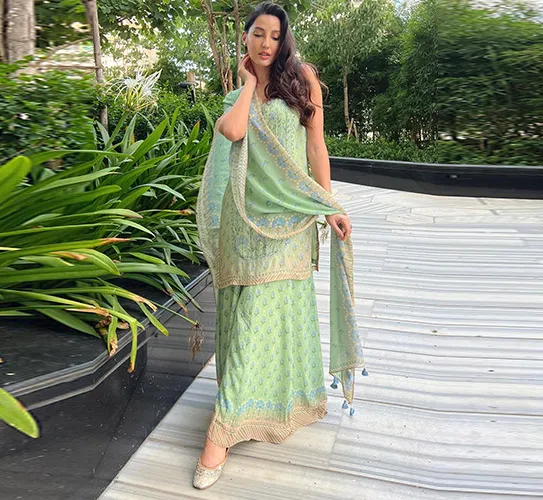 Nora Fatehi sets style in a green sharara, sending the internet into a meltdown.-1