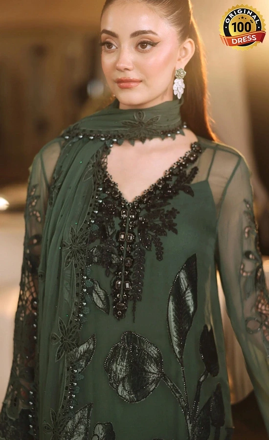Dark green salwar kameez for wedding guests with elegant hand embroidery and organza detailing