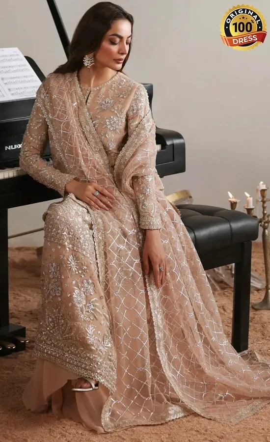 Pakistani pink salwar kameez for wedding guests with embroidered chiffon and elegant festive detailing