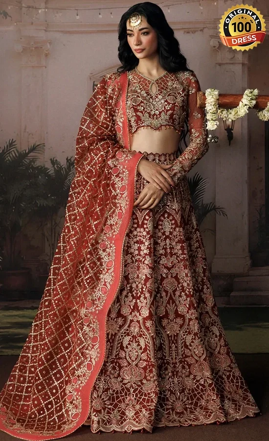 Orange colour lehenga choli for wedding guests with elegant embroidery and traditional detailing