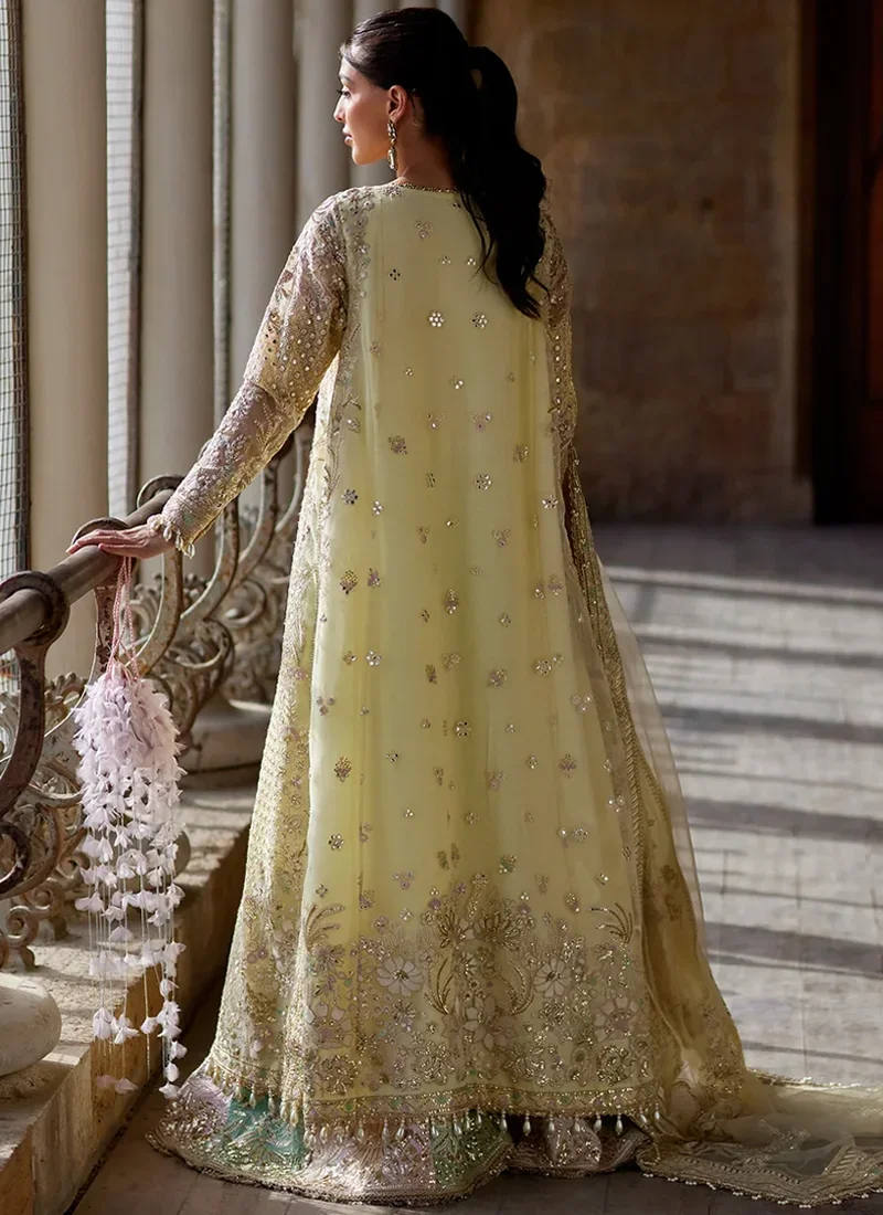 Yellow shalwar kameez with embroidered front panels and patchwork detailing