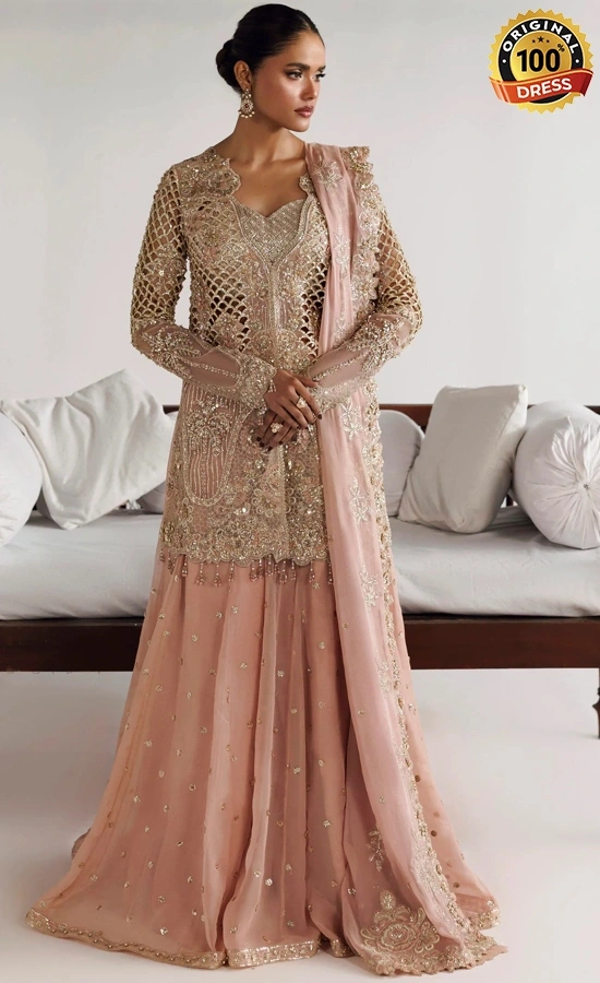 Peach lehenga for wedding guests with elegant embroidery and traditional detailing
