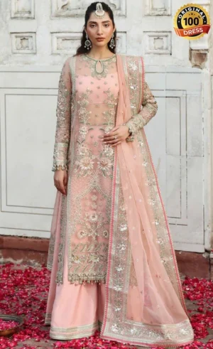 Punjabi pink suit for wedding guests with hand embroidery and elegant sharara design