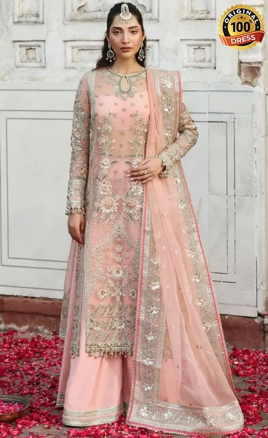Punjabi Pink Suit For Wedding Guests Punjabi pink suit for wedding guests with hand embroidery and elegant sharara design