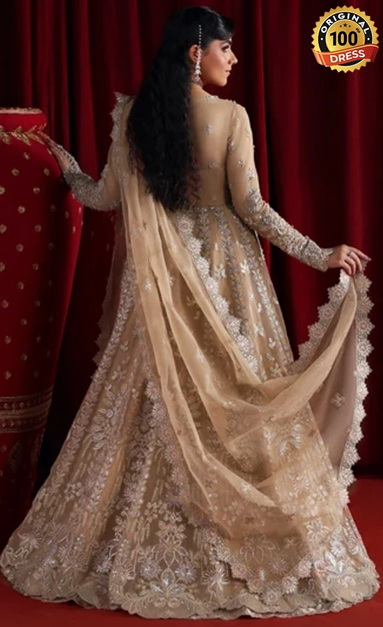 Brown cotton maxi dress with hand embroidery, tassels and traditional finishing