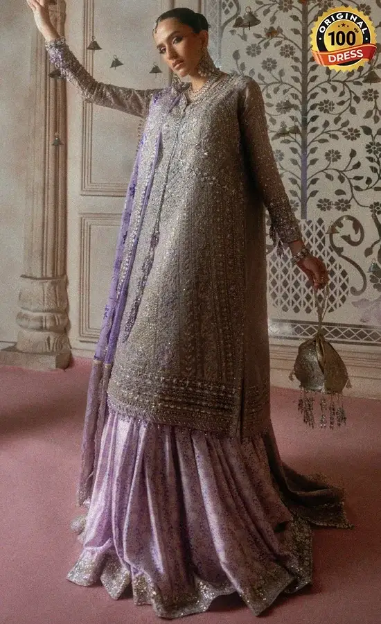 Pakistani purple sharara for wedding guests with intricate embroidery and traditional formal styling
