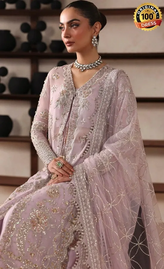 Embroidered baby pink salwar kameez for wedding guests with hand embellished chiffon and organza detailing