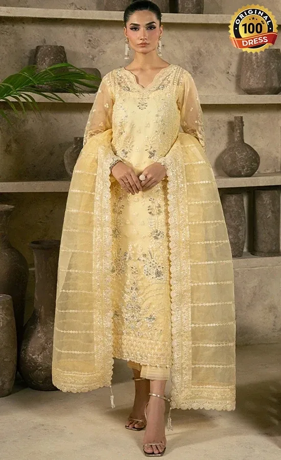 Pastel Yellow Salwar Kameez For Wedding Guests 01 Pastel yellow organza salwar kameez with raw silk and intricate embroidered finishing