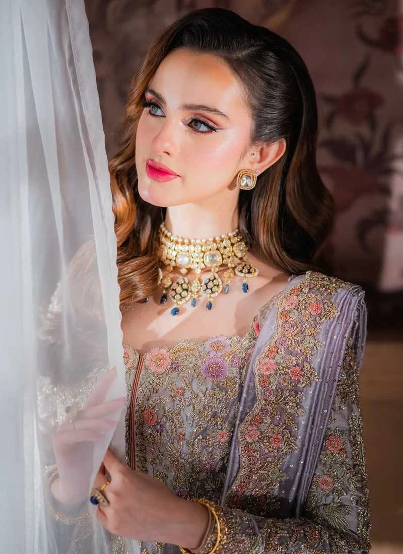 Lilac tissue frock and full-ghera Jamawar lehenga with zardozi, dabka, resham and pearl work