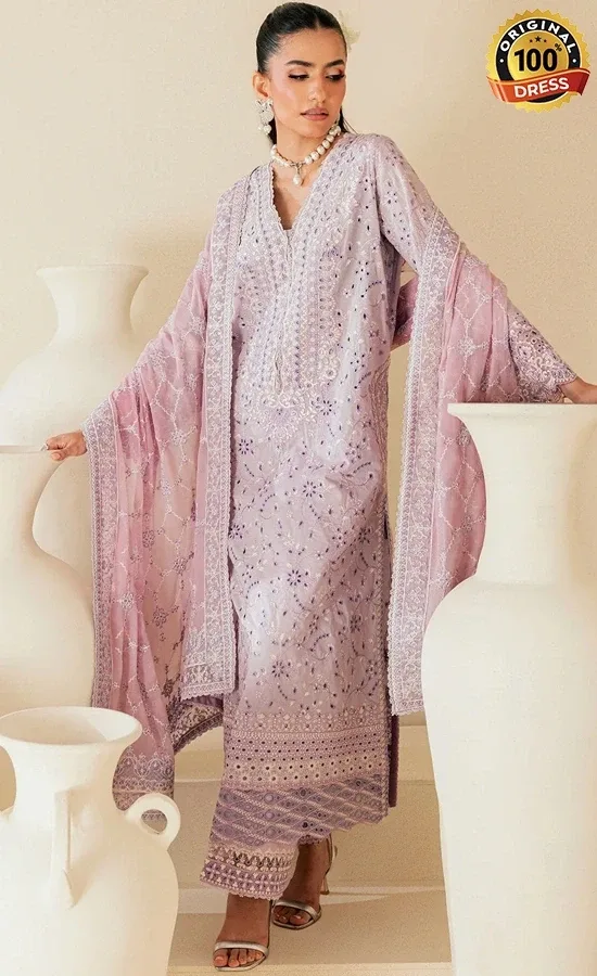 Lilac embroidered shalwar kameez with tassels and sequinned lace detailing