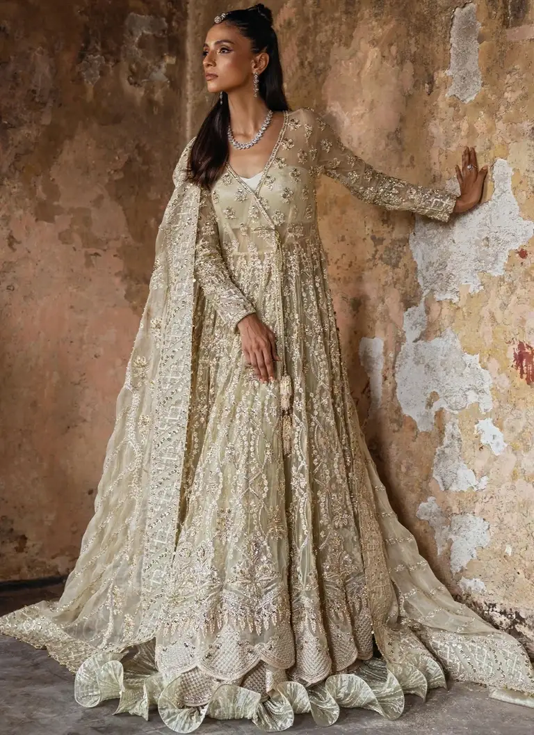 Butter yellow Mehndi Angrakha for bride with intricate embroidery and elegant festive detailing