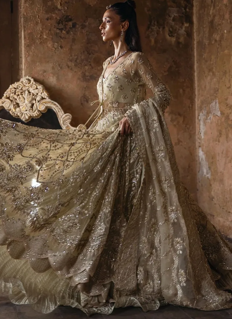 Butter yellow Angrakha for brides with elegant embroidery and traditional bridal styling