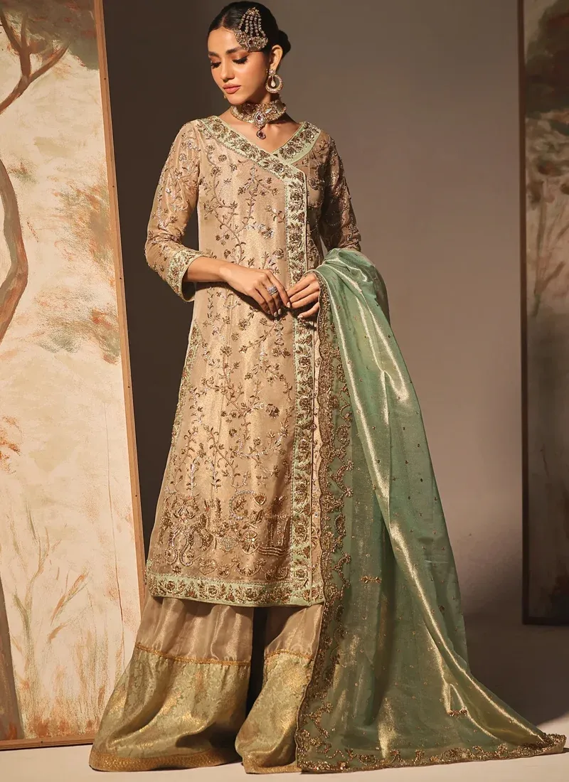 Champagne gold wedding Angrakha dress with elegant bridal styling and mint green dupatta