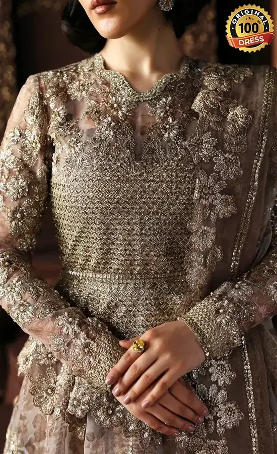 Champagne lehenga choli with hand embroidery, samosa lace and shuttle lace finishing