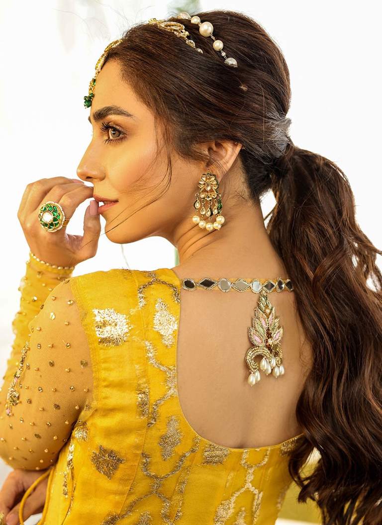 Embroidered yellow Angrakha frock with lehenga featuring handcrafted details and festive bridal styling