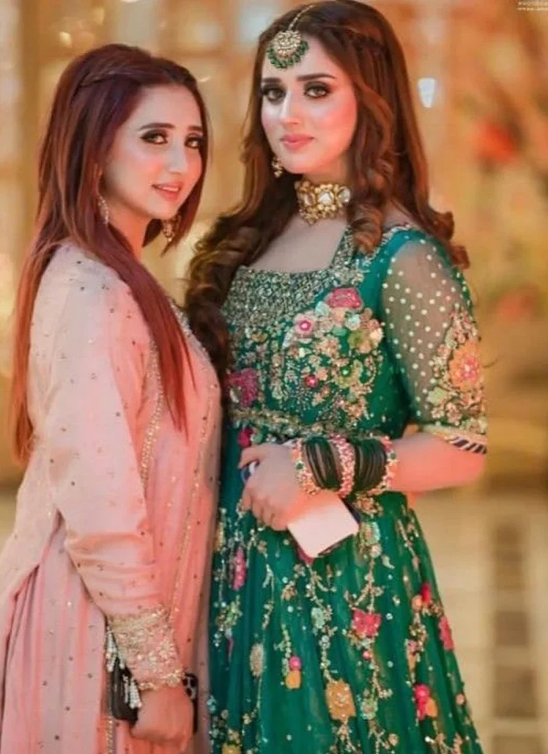 Floral emerald green Pakistani bridal dress with Pishwas silhouette, lehenga and sparkling crystal detailing