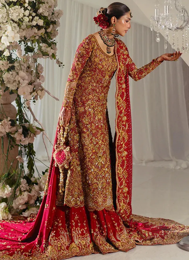 Red Farshi lehenga with plain centre skirt, large embroidered flowers and arched lower border