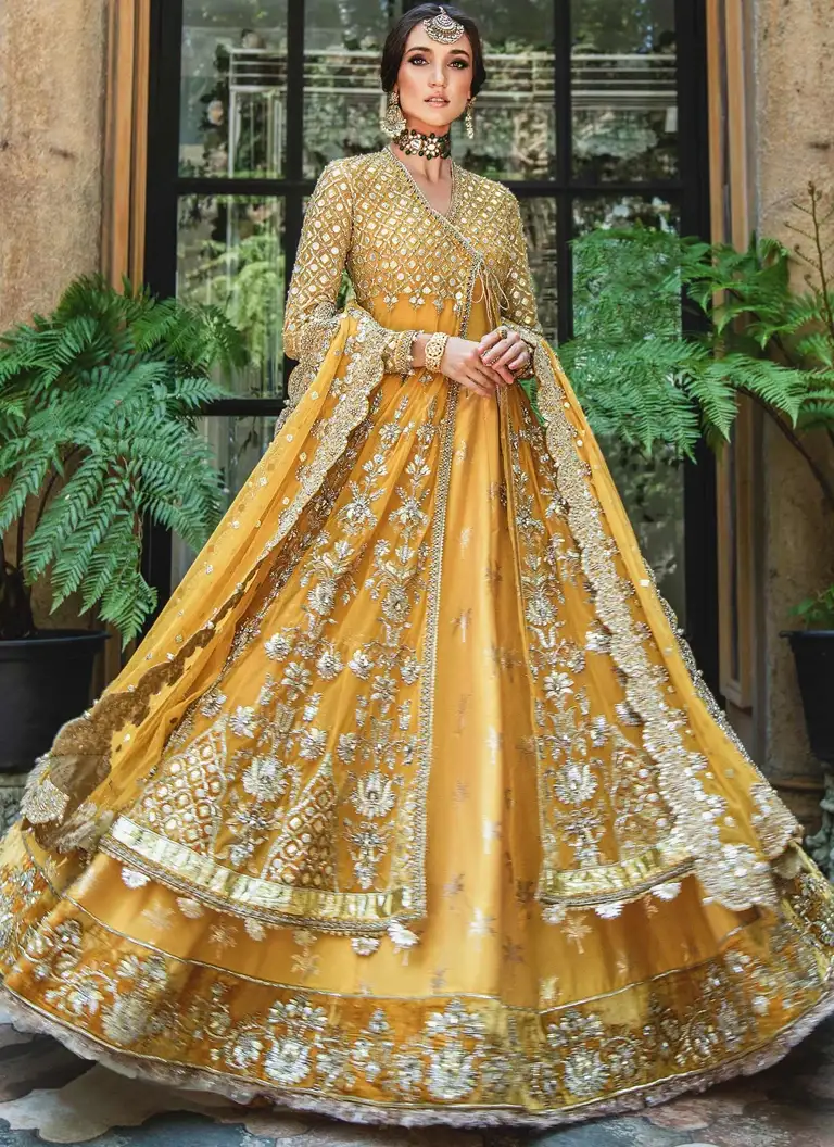 Mustard Angrakha for Mehndi bride with elegant embroidery and traditional bridal styling