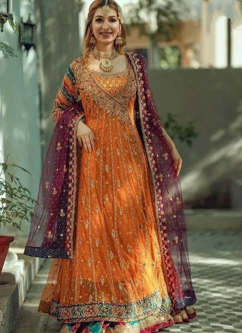 Mustard orange Angrakha for Mehndi bride featuring vibrant multicolour embroidery and festive styling