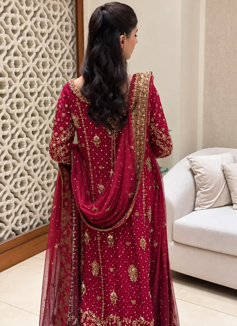 Pakistani ruby red long dress with detailed gold hand embroidery for weddings and formal events