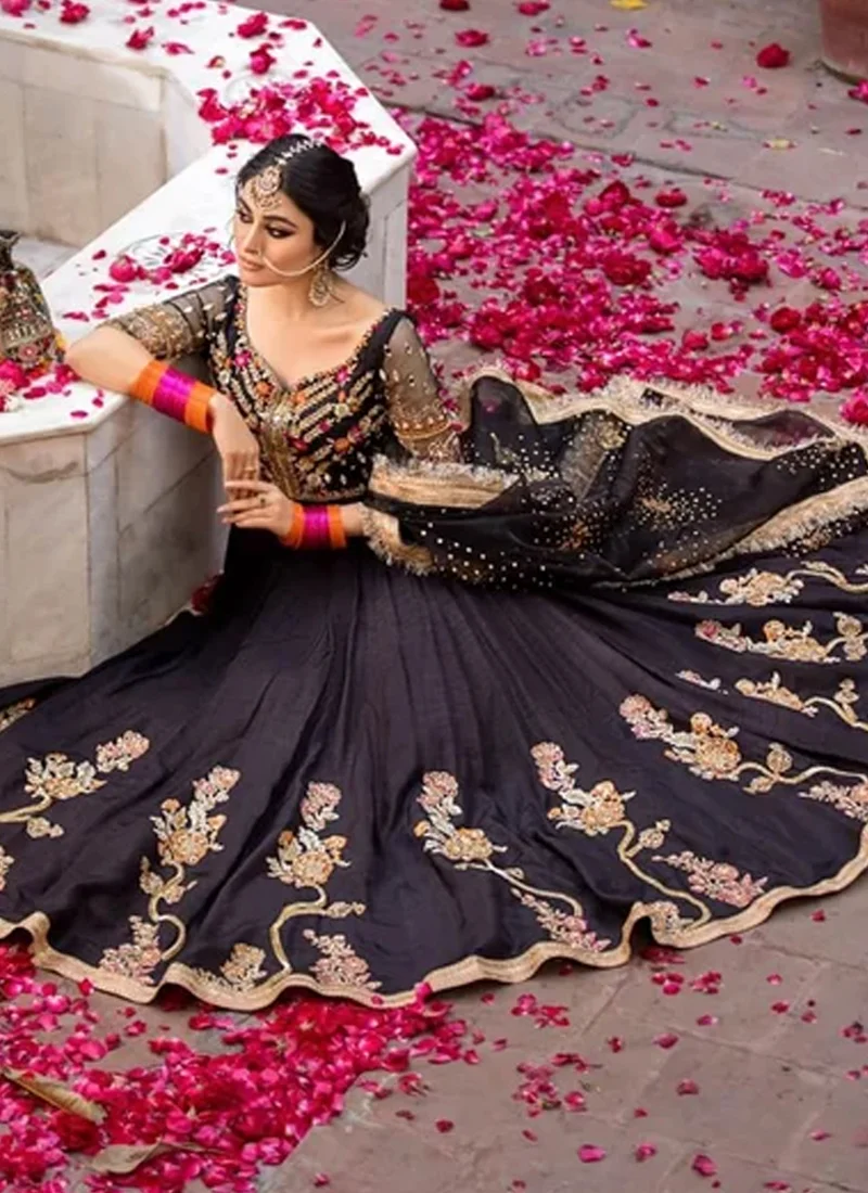 Black pishwas front bodice with gold floral embroidery, mirror accents and sheer embellished sleeves