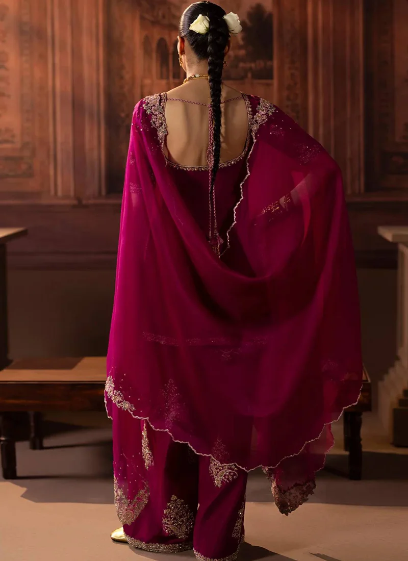 Fuchsia embroidered shirt close-up showing square neckline, floral sleeve motifs and sheer dupatta