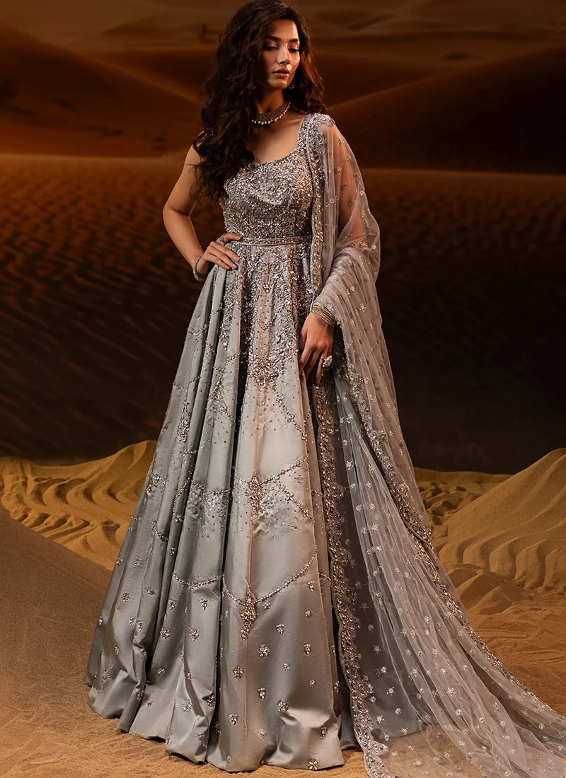 Gray bridal gown, angled back close-up showing deep V neckline, crystal embroidery and embellished waist belt