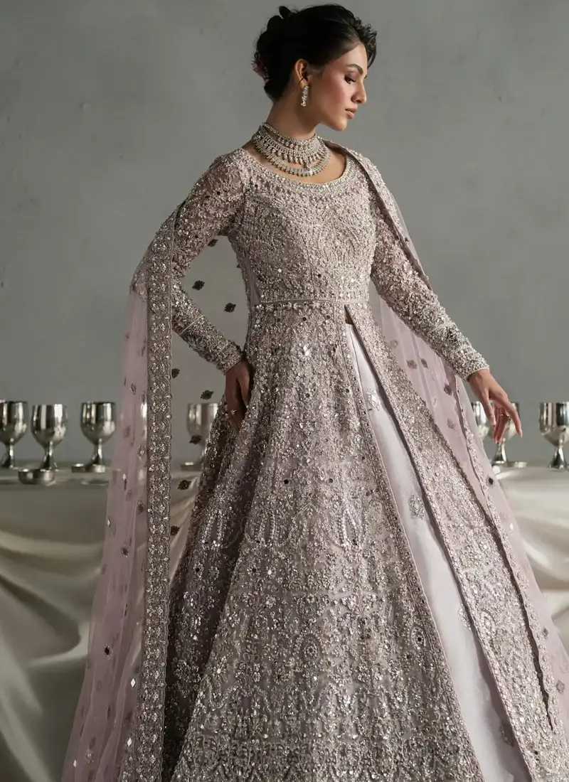 Lilac Nikkah gown front view with fitted sleeves, centre-front opening and arched floral embroidered hem