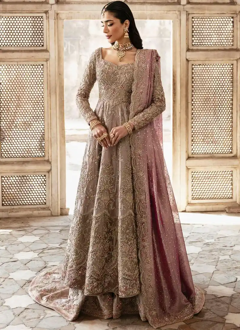 Lilac bridal farshi lehenga full-length front view with gold floral embroidery and trailing mauve dupatta