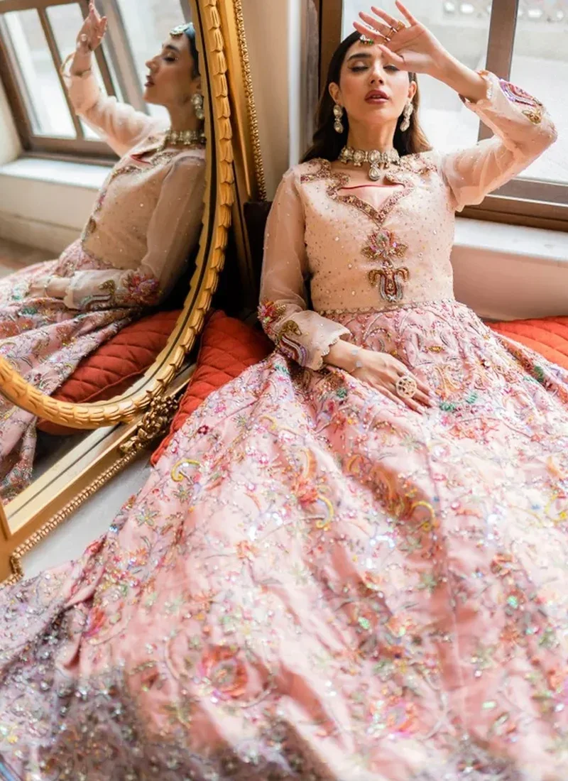 Salmon pink bridal maxi side view with a silver-lilac scalloped border and ivory pleated hem frill